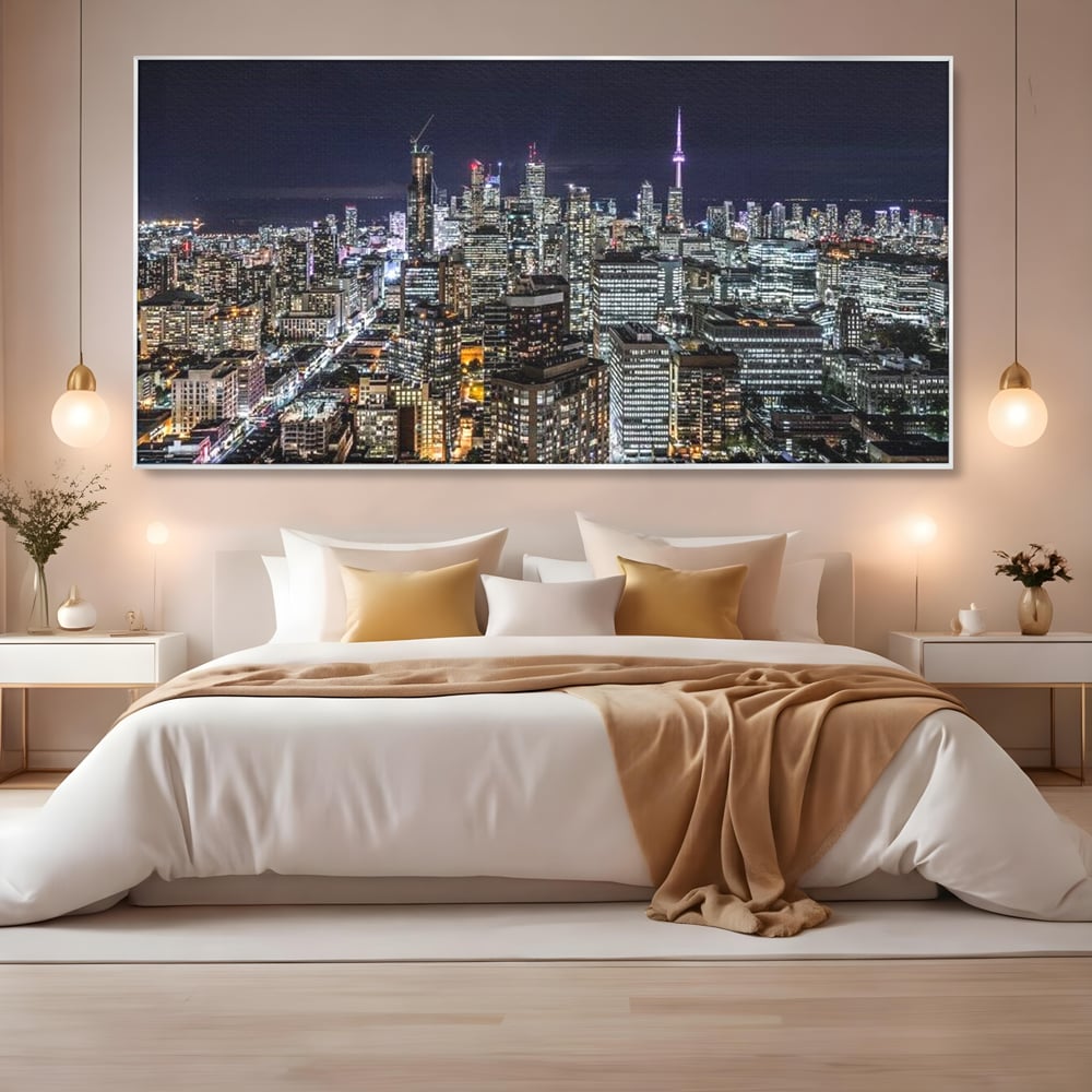Tablou canvas cu panoramic nocturn cu toronto si cn tower, in rama de aluminiu argintiu, pe perete intr-un dormitor